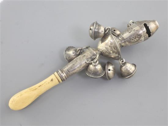 A 19th century ivory handled silver childs rattle, 13.4